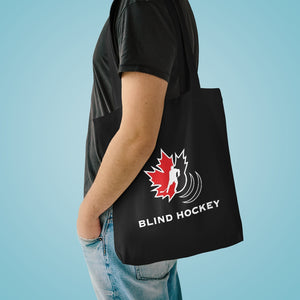 Individual with the Canadian blind hockey tote bag over their shoulder 